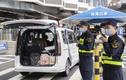 春节假期港澳单牌车“北上”热 大桥口岸通关忙